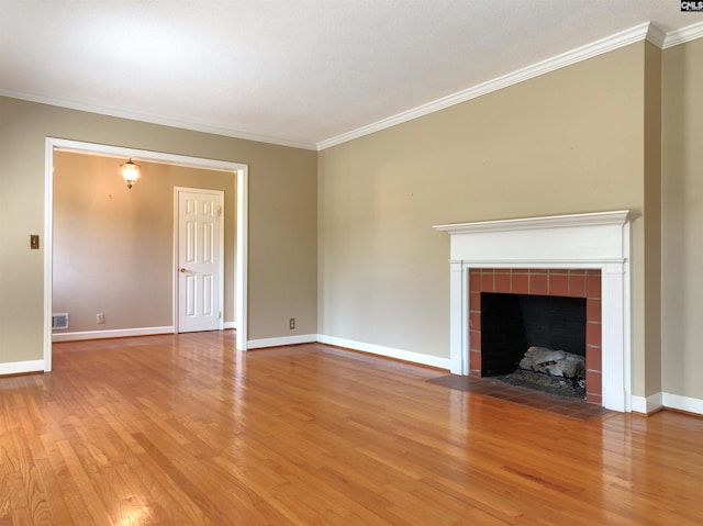 325 Third Ave, Lexington, SC 29072 - unfurnished living room featuring light wood finished floors, a tile fireplace, baseboards, and ornamental molding