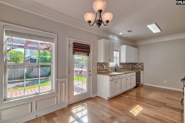 113 Wild Spring Rd, Lexington, SC 29072 - kitchen featuring visible vents, a sink, a chandelier, crown molding, and light wood finished floors