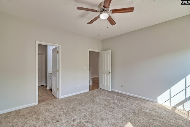 113 Wild Spring Rd, Lexington, SC 29072 - unfurnished bedroom with a ceiling fan, carpet flooring, baseboards, and ensuite bathroom