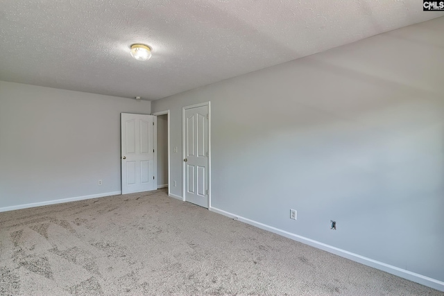 113 Wild Spring Rd, Lexington, SC 29072 - spare room featuring baseboards, a textured ceiling, and carpet floors