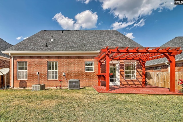113 Wild Spring Rd, Lexington, SC 29072 - back of house featuring a pergola, brick siding, a deck, fence, and a lawn