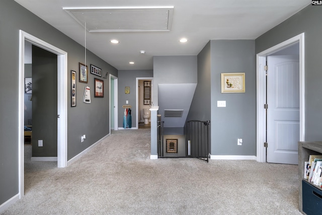 corridor featuring baseboards, an upstairs landing, recessed lighting, attic access, and carpet flooring