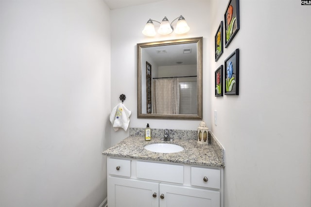 full bathroom with vanity