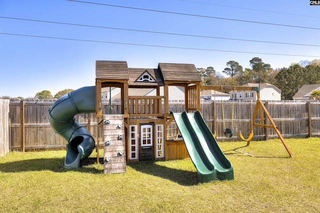 view of play area featuring a fenced backyard and a lawn