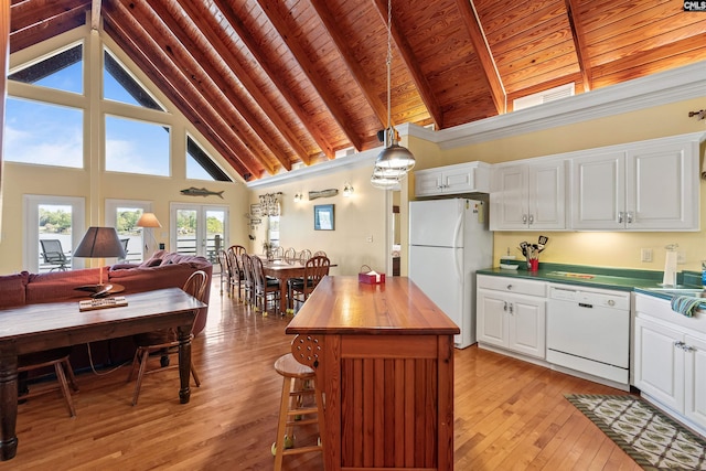 1724 Gold Nugget Pt, Prosperity, SC 29127 - kitchen with high vaulted ceiling, white appliances, white cabinetry, wood ceiling, and butcher block countertops