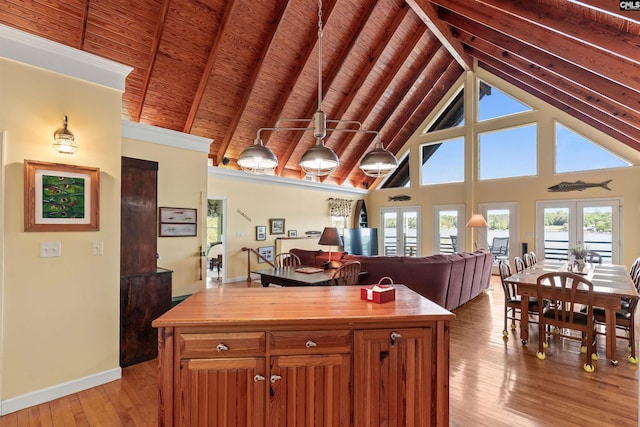 1724 Gold Nugget Pt, Prosperity, SC 29127 - kitchen featuring a wealth of natural light, light wood-type flooring, beamed ceiling, and wooden counters