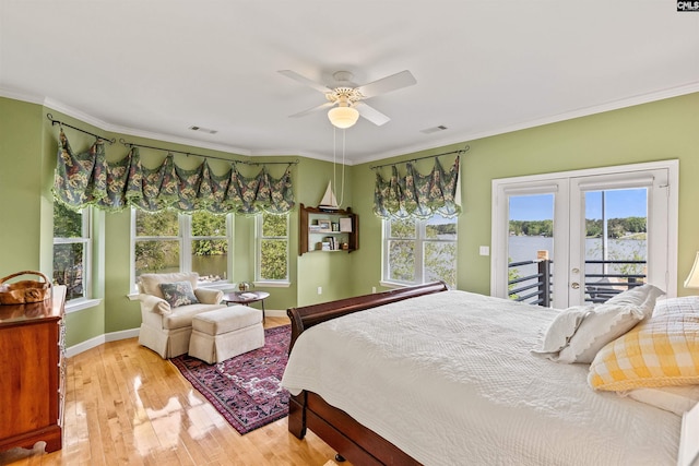 1724 Gold Nugget Pt, Prosperity, SC 29127 - bedroom featuring visible vents, ornamental molding, wood finished floors, french doors, and access to outside