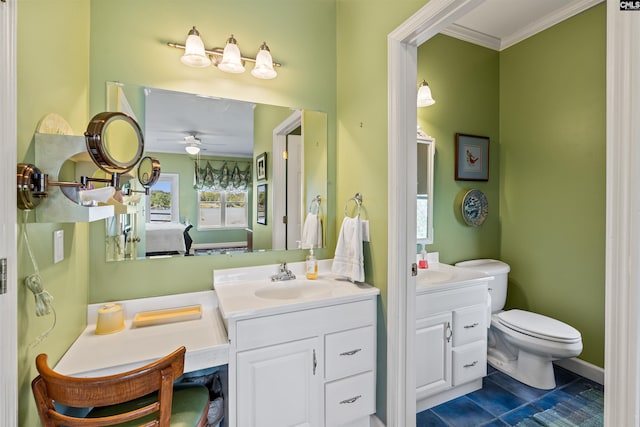 1724 Gold Nugget Pt, Prosperity, SC 29127 - bathroom with vanity, ornamental molding, a ceiling fan, tile patterned flooring, and toilet