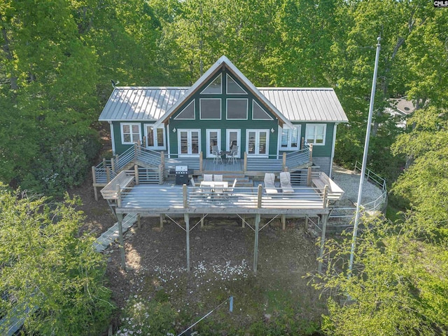 1724 Gold Nugget Pt, Prosperity, SC 29127 - back of property featuring stairway, a deck, metal roof, and a standing seam roof
