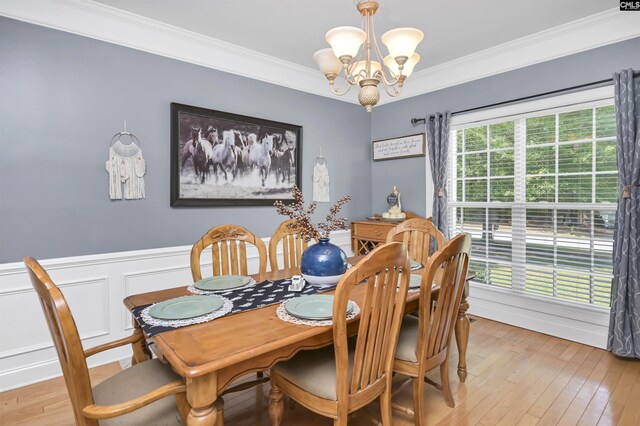304 Oakhurst Pl, Blythewood, SC 29016 - dining room featuring a chandelier, light wood-type flooring, and ornamental molding
