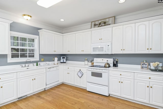 304 Oakhurst Pl, Blythewood, SC 29016 - kitchen featuring a sink, white cabinetry, white appliances, and crown molding