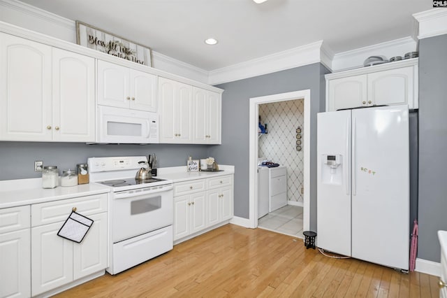304 Oakhurst Pl, Blythewood, SC 29016 - kitchen featuring crown molding, light wood finished floors, white appliances, and white cabinets