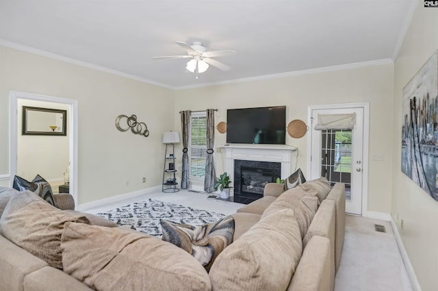 304 Oakhurst Pl, Blythewood, SC 29016 - living room with light carpet, crown molding, a ceiling fan, and baseboards