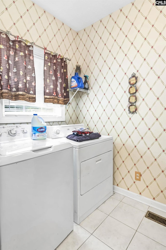 304 Oakhurst Pl, Blythewood, SC 29016 - laundry room featuring laundry area, light tile patterned floors, visible vents, wallpapered walls, and washing machine and dryer