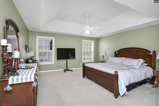 304 Oakhurst Pl, Blythewood, SC 29016 - bedroom featuring baseboards, a tray ceiling, light colored carpet, and ceiling fan