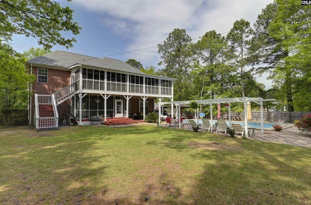304 Oakhurst Pl, Blythewood, SC 29016 - rear view of house with a pergola, a patio, a sunroom, and a fenced in pool