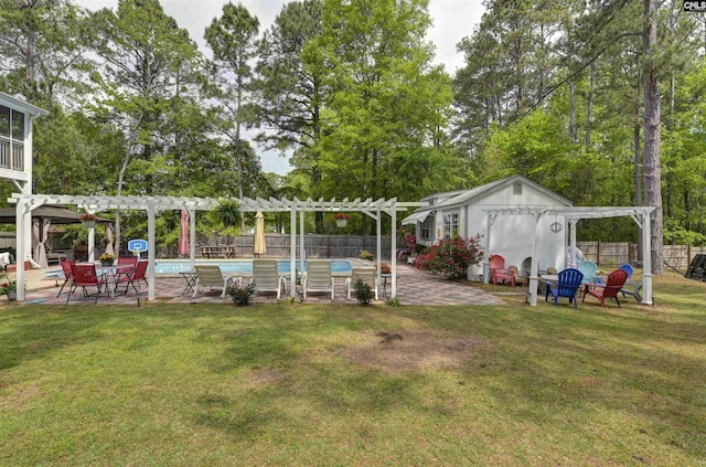 304 Oakhurst Pl, Blythewood, SC 29016 - view of yard featuring a pergola, fence, an outdoor structure, a patio, and a fenced in pool