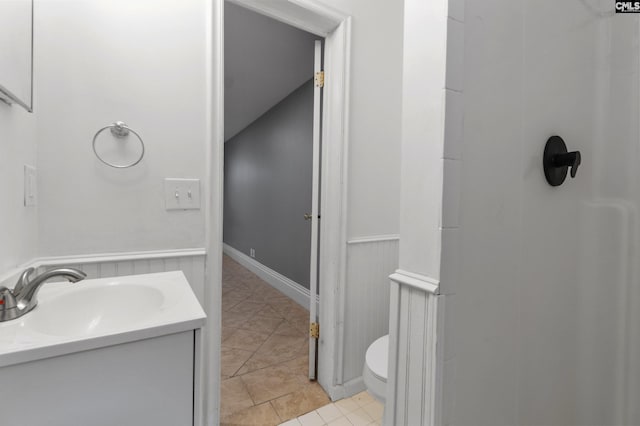 full bath featuring tile patterned floors, toilet, and vanity
