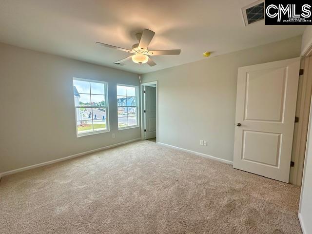 2022 Skyline Rd, Columbia, SC 29229 - unfurnished bedroom featuring carpet and baseboards