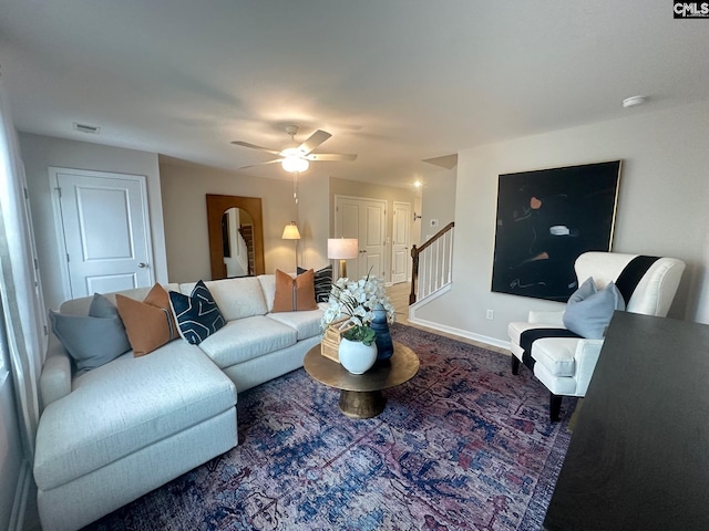 2022 Skyline Rd, Columbia, SC 29229 - living area with a ceiling fan, stairs, baseboards, and arched walkways