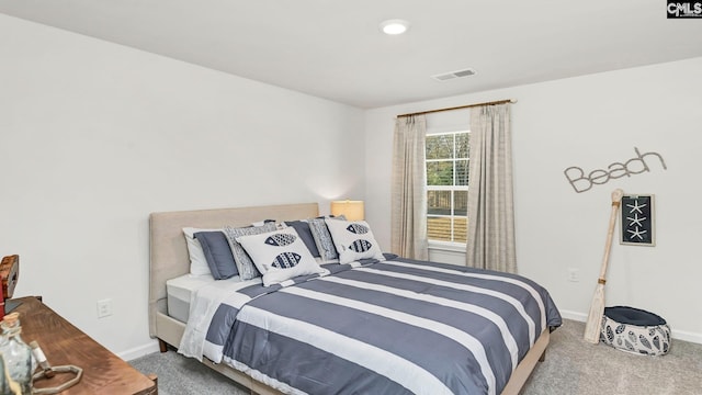 carpeted bedroom with recessed lighting, visible vents, and baseboards