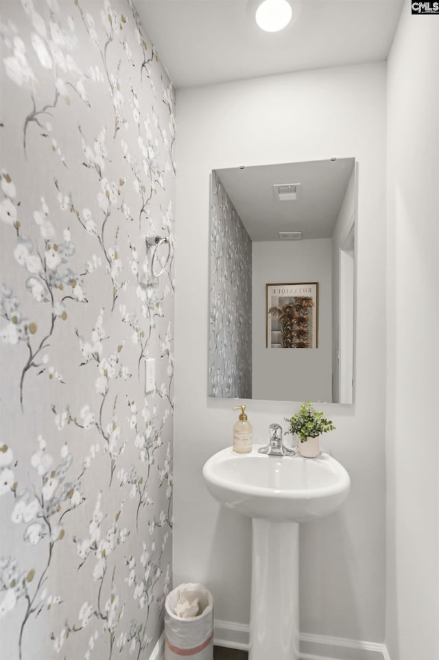 bathroom featuring baseboards