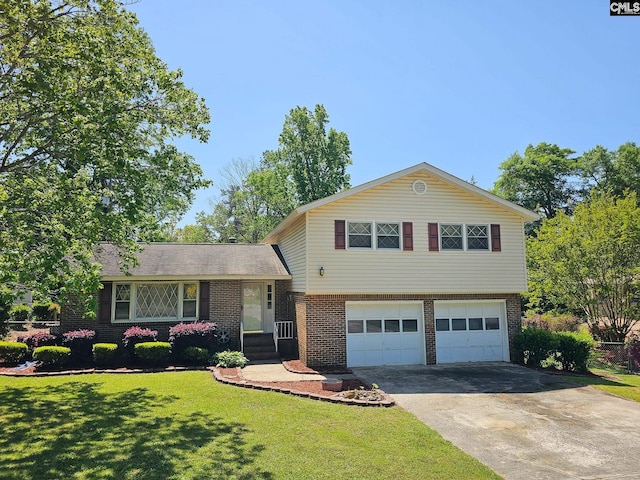 tri-level home with brick siding, an attached garage, driveway, and a front lawn