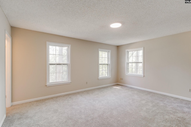 1605 Quail Lake Dr, West Columbia, SC 29169 - unfurnished room with a textured ceiling, baseboards, and carpet floors