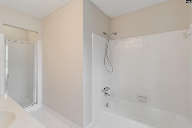 1605 Quail Lake Dr, West Columbia, SC 29169 - bathroom featuring washtub / shower combination, vanity, a textured ceiling, and tile patterned flooring
