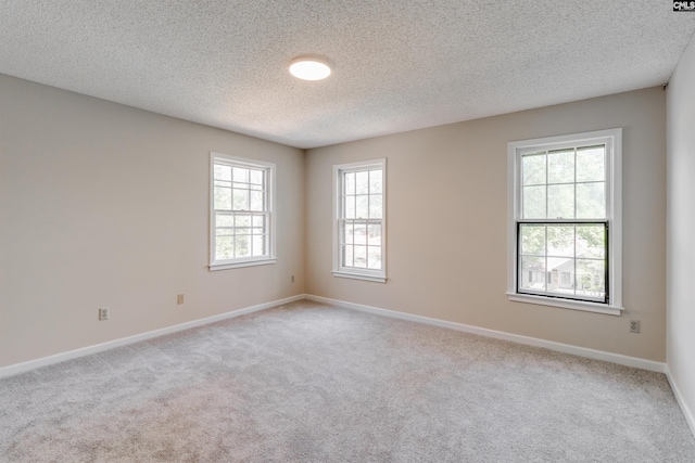 1605 Quail Lake Dr, West Columbia, SC 29169 - carpeted empty room with baseboards and a textured ceiling