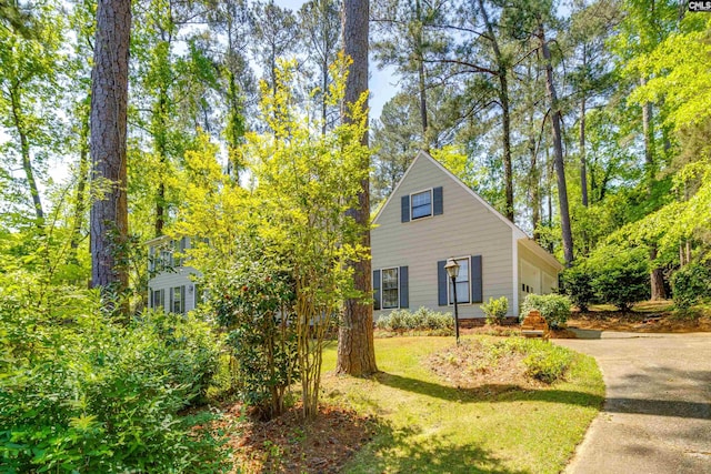 1605 Quail Lake Dr, West Columbia, SC 29169 - exterior space with concrete driveway, a yard, and an attached garage