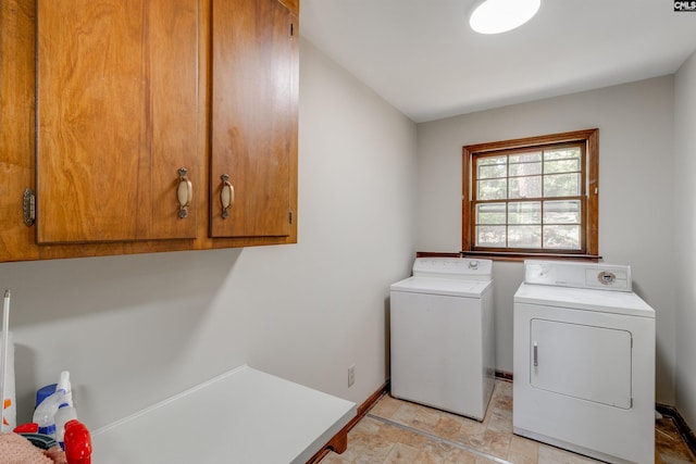 1605 Quail Lake Dr, West Columbia, SC 29169 - laundry room featuring washer and dryer and cabinet space