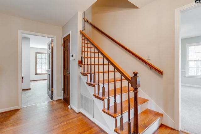 1605 Quail Lake Dr, West Columbia, SC 29169 - stairway featuring plenty of natural light, visible vents, and wood finished floors