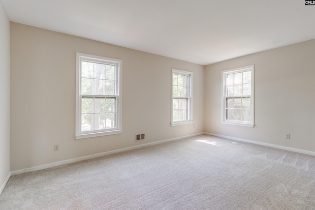 1605 Quail Lake Dr, West Columbia, SC 29169 - spare room featuring visible vents, baseboards, and light colored carpet