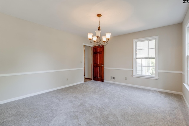 1605 Quail Lake Dr, West Columbia, SC 29169 - carpeted empty room with visible vents, baseboards, and a notable chandelier