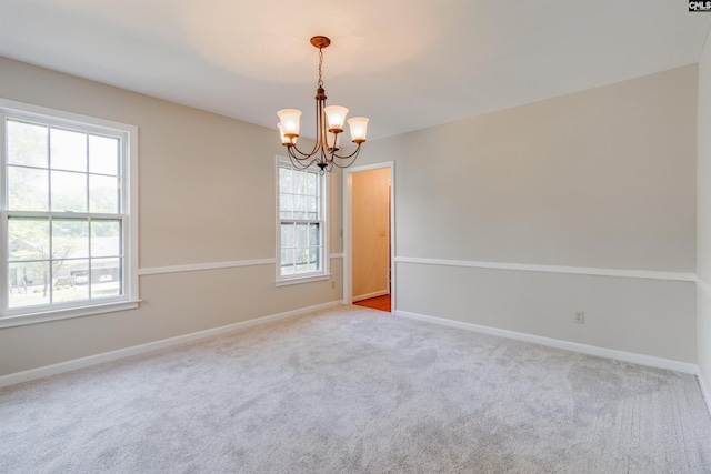 1605 Quail Lake Dr, West Columbia, SC 29169 - empty room with baseboards, an inviting chandelier, and carpet floors