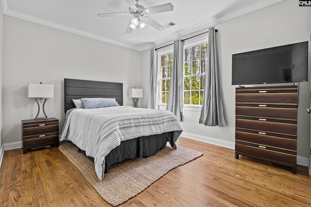124 Loch Levin Ln, Lexington, SC 29072 - bedroom featuring crown molding, a ceiling fan, visible vents, wood finished floors, and baseboards