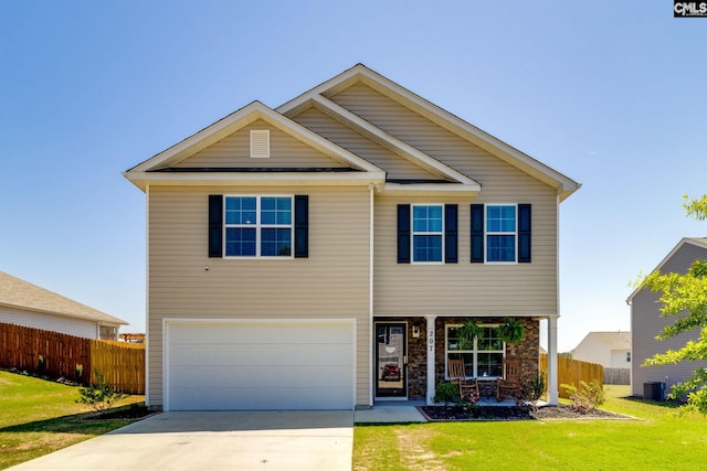view of front of home with a garage, central AC, fence, a front lawn, and concrete driveway