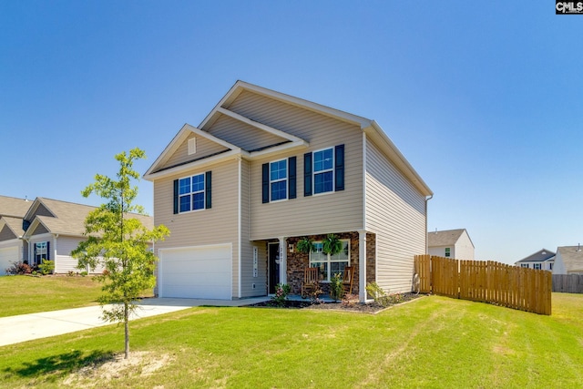 view of front of property with driveway, stone siding, a front yard, a garage, and fence