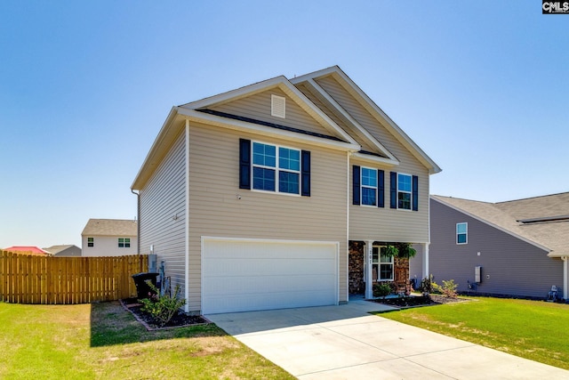 view of front of property featuring driveway, a garage, a front yard, and fence
