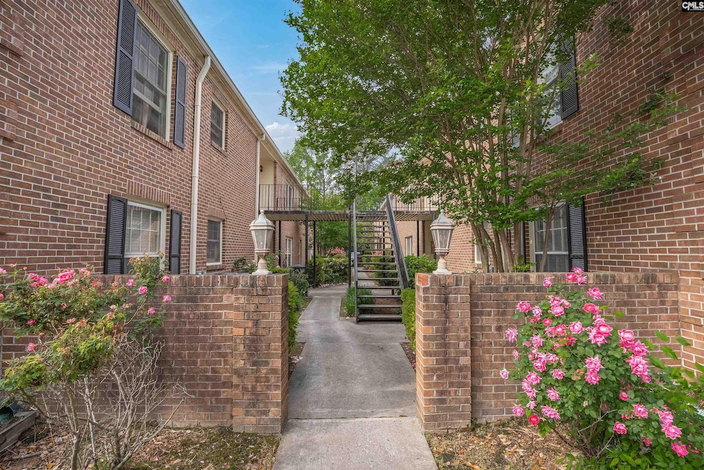 5516 Lakeshore Dr Unit 716, Columbia, SC 29206 - view of home's exterior with stairs and brick siding