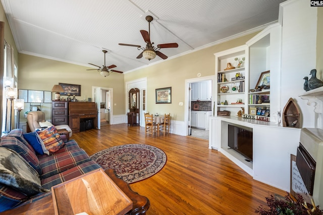 131 Pine St, Salley, SC 29137 - living room with ornamental molding, ceiling fan, wood finished floors, and a fireplace