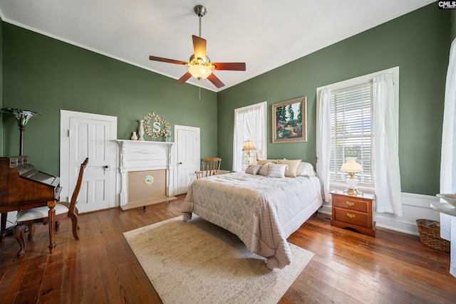 131 Pine St, Salley, SC 29137 - bedroom with ornamental molding, baseboards, a ceiling fan, and hardwood / wood-style flooring