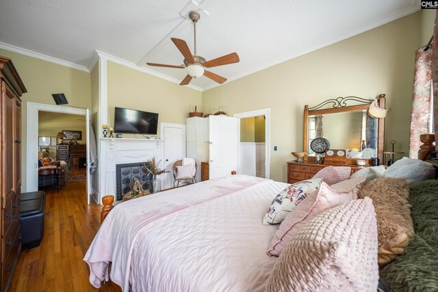 131 Pine St, Salley, SC 29137 - bedroom featuring ornamental molding, ceiling fan, wood finished floors, and a fireplace