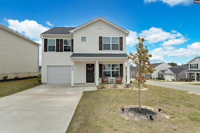 traditional-style home with a front yard, an attached garage, covered porch, driveway, and roof with shingles