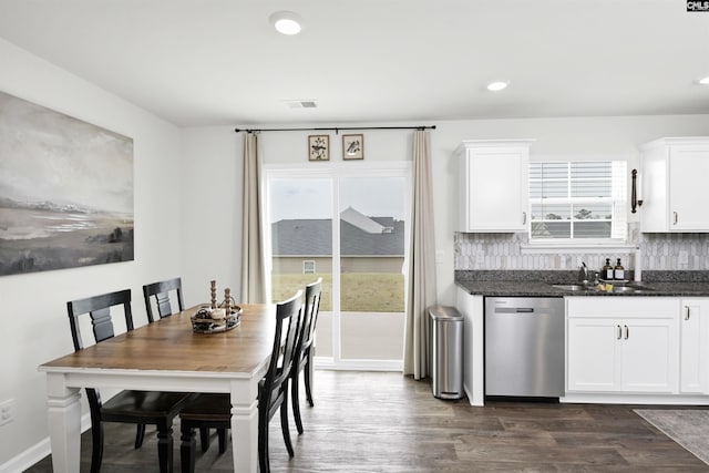 dining room featuring dark wood-type flooring, visible vents, and recessed lighting
