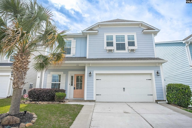 126 Sunset Bay Ln, Lexington, SC 29072 - traditional-style home featuring a garage, driveway, and a shingled roof
