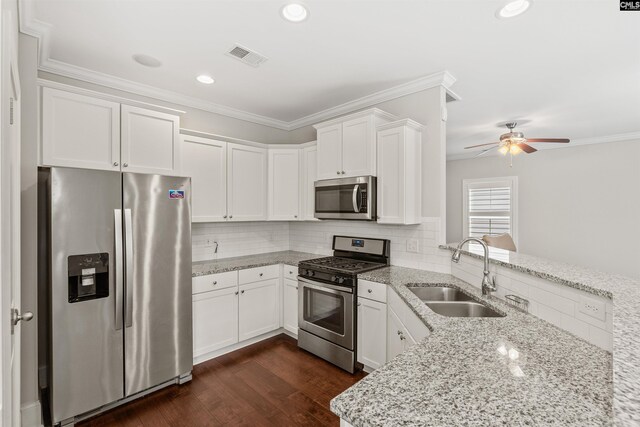126 Sunset Bay Ln, Lexington, SC 29072 - kitchen with a peninsula, white cabinets, visible vents, appliances with stainless steel finishes, and a sink