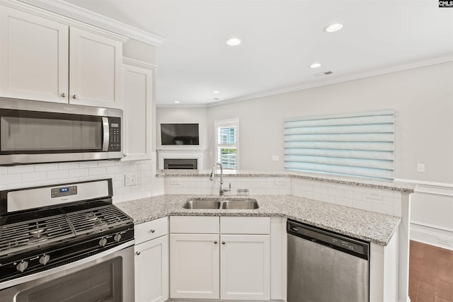 126 Sunset Bay Ln, Lexington, SC 29072 - kitchen with crown molding, appliances with stainless steel finishes, a sink, and visible vents
