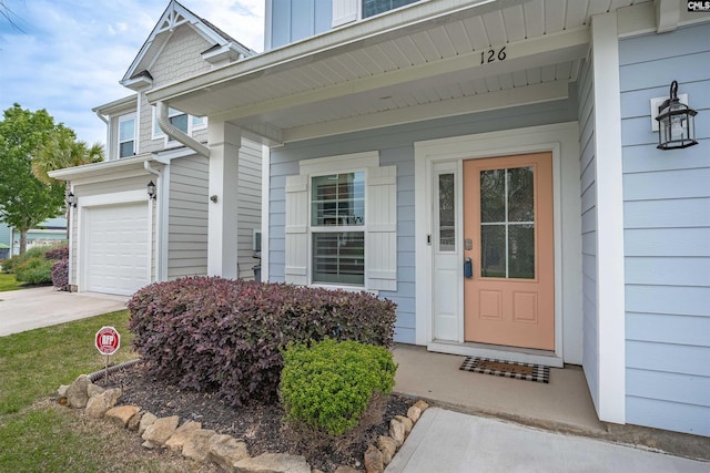126 Sunset Bay Ln, Lexington, SC 29072 - doorway to property featuring an attached garage and concrete driveway